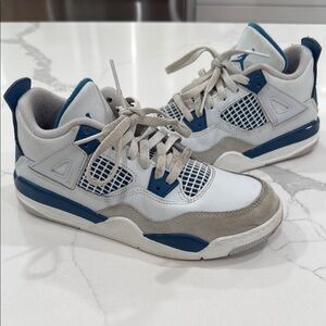 Nike Jordan 4 Retro White and Blue Sneakers with Air Unit and Mesh Panels